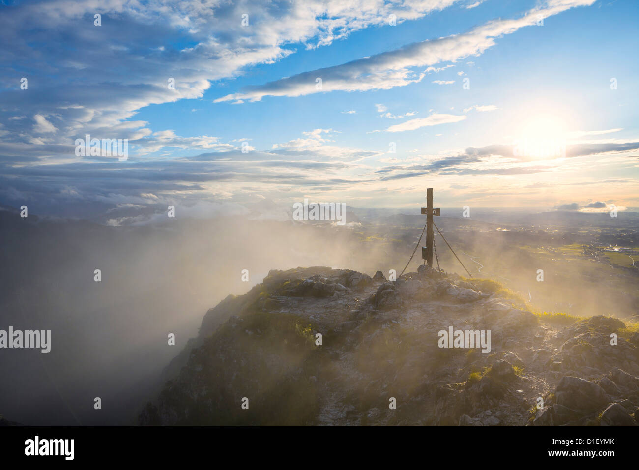 PeakSummit cross of the Schober in fog, Salzkammergut, Austria Stock Photo