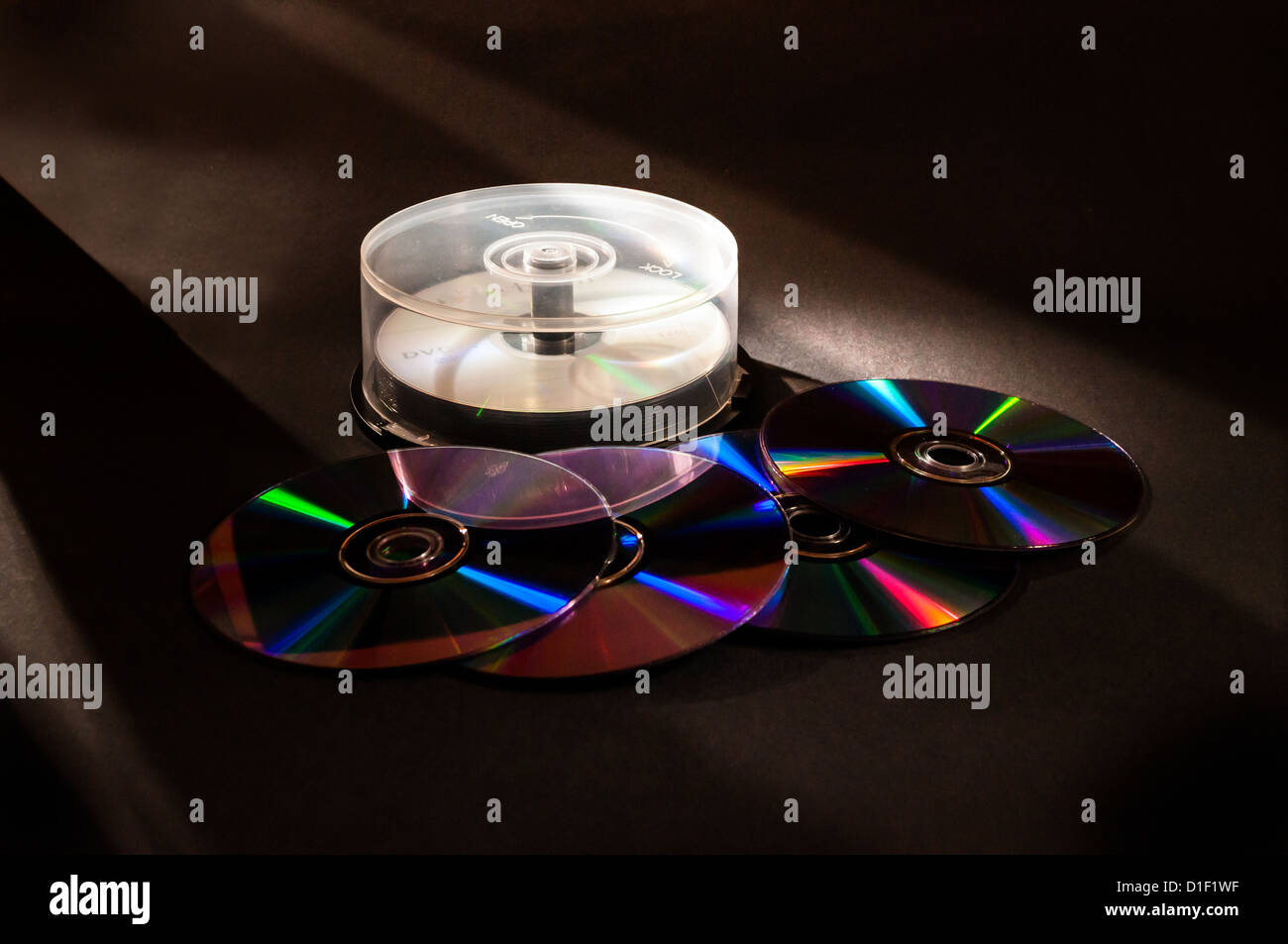 A pack of DVDs reflecting multi colours Stock Photo