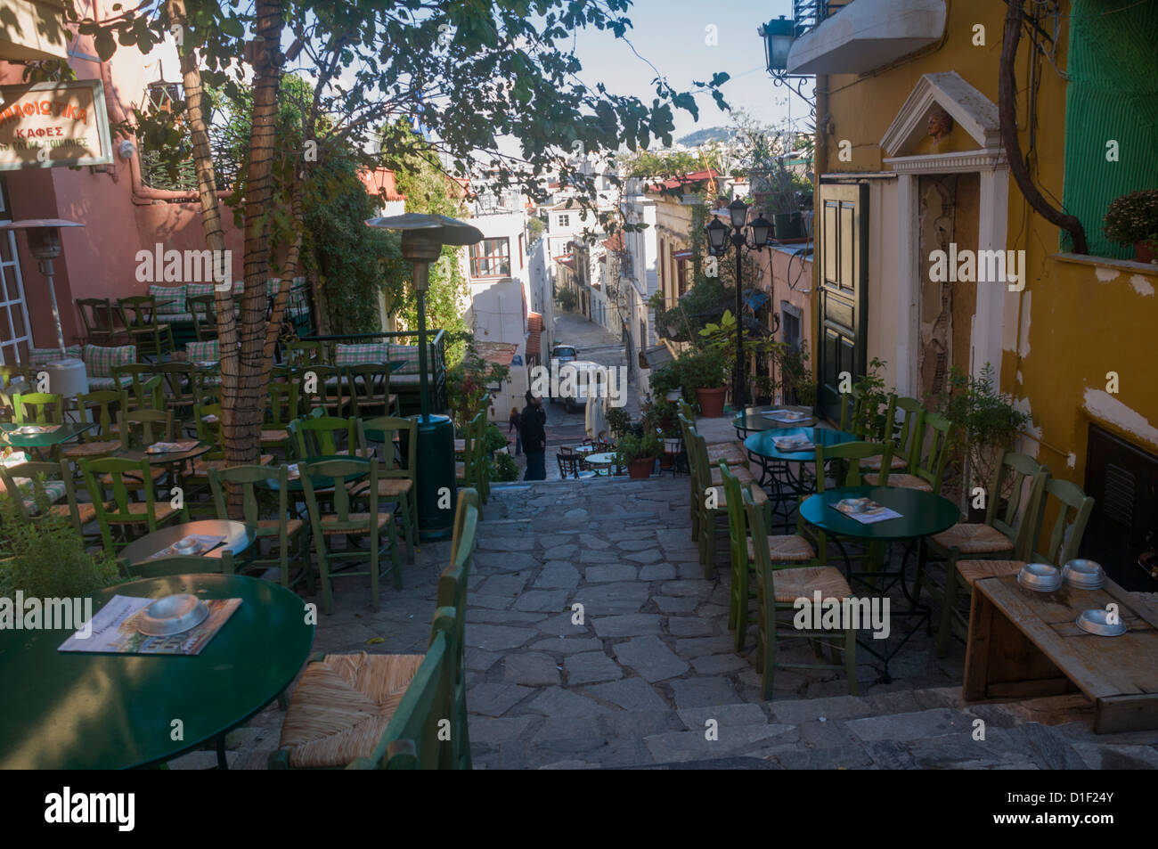 Outdoor dining in the Narrow Mnisikleous street, Plaka, Athens, Greece Stock Photo