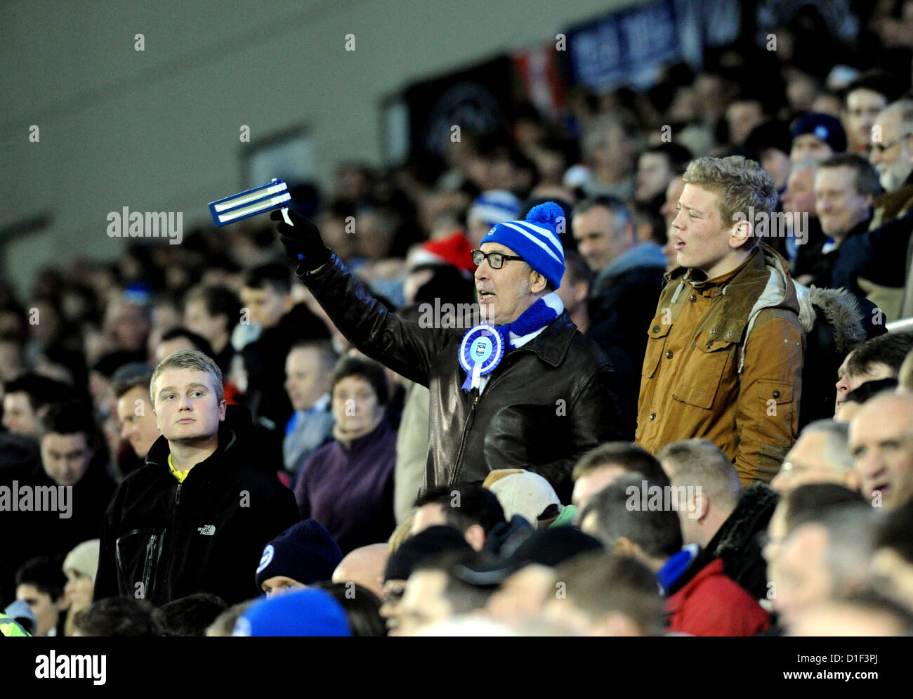 Brighton and Hove Albion football fan with an old fashioned rattle - Editorial use only. No merchandising. For Football images FA and Premier League restrictions apply inc. no internet/mobile usage without FAPL license - for details contact Football Dataco Stock Photo