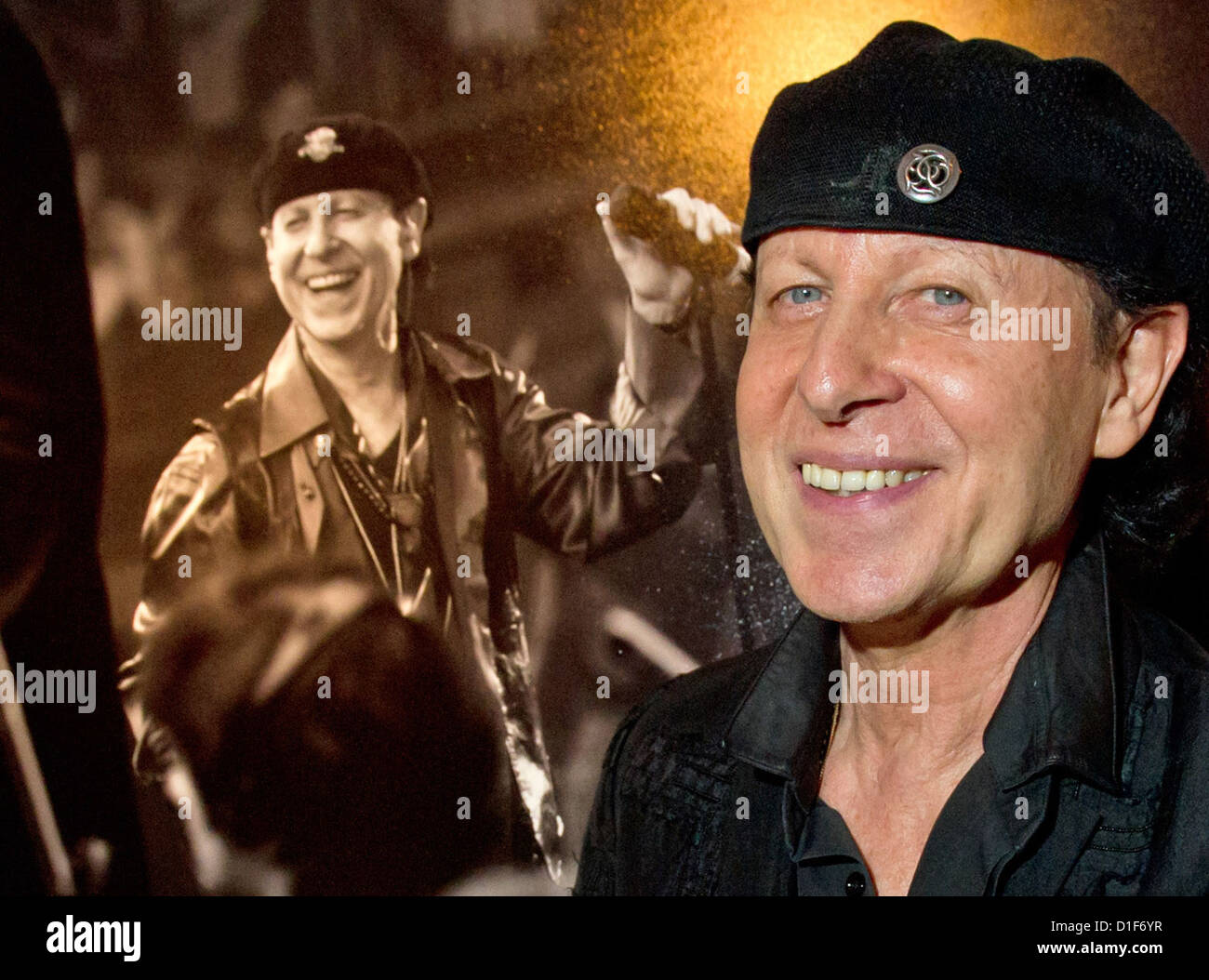 Klaus Meine, singer of rock band 'Scorpions,' stands before the opening of a photo exhibition of photographs of the band in Munich, Germany, 18 December 2012. Last night, the final concert of the 'Final Sting World Tour 2012' took place in Munich. Photo: PETER KNEFFEL Stock Photo