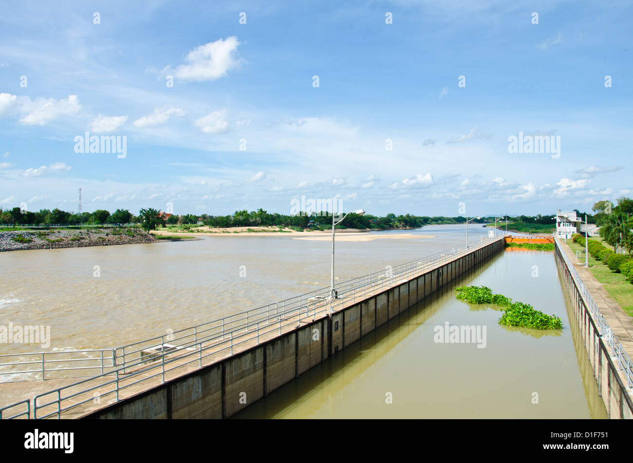 Channels can be adjusted to the level water for boat passes  through the dam Stock Photo