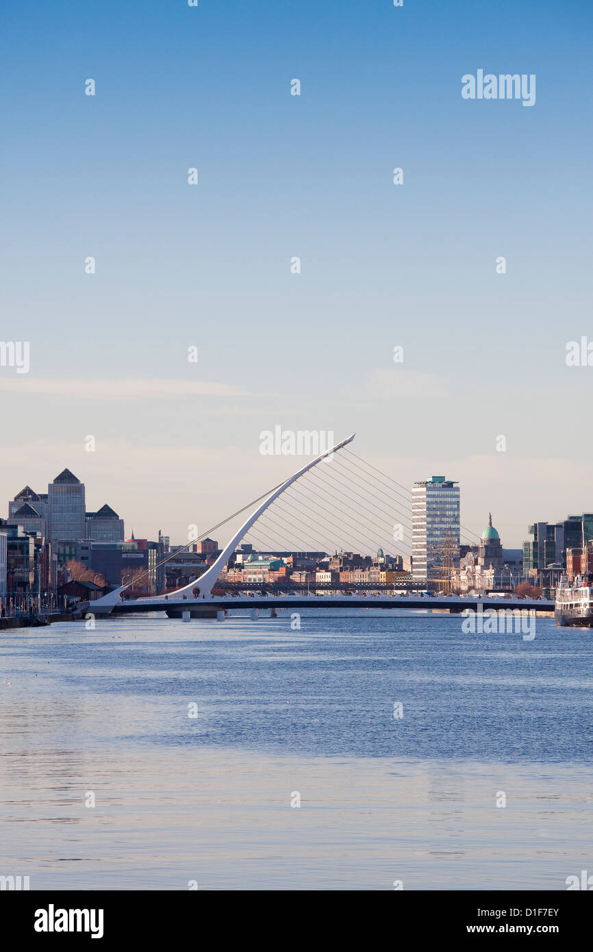 River Liffey, Dublin in Sunshine, looking west with Samuel Beckett Bridge Stock Photo