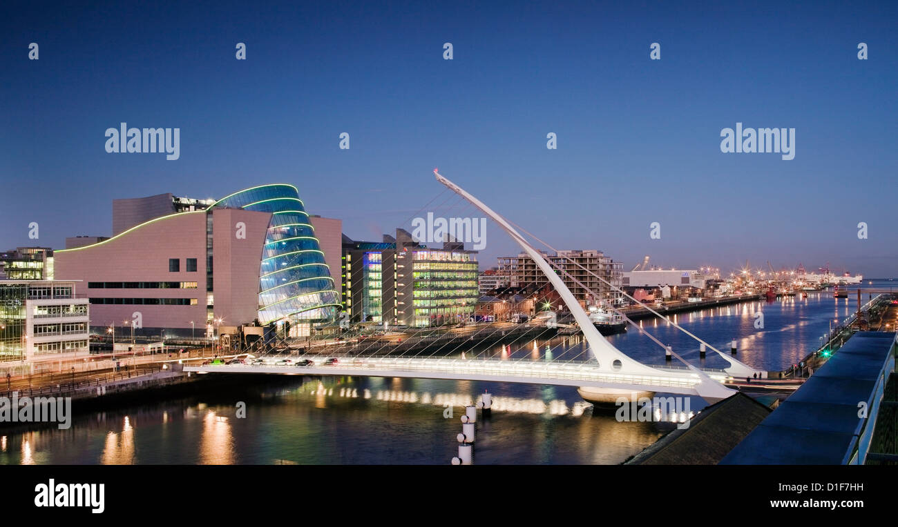 Architect Santiago Calatrava's Sam Beckett Bridge, Dublin, with Cublin Convention Centre Stock Photo