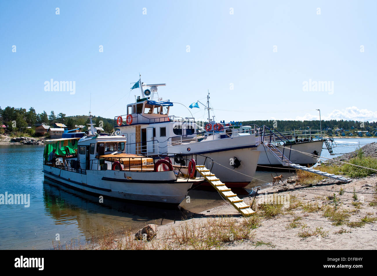 moored motorboat on quay near coast, republic kazakhstan Stock Photo