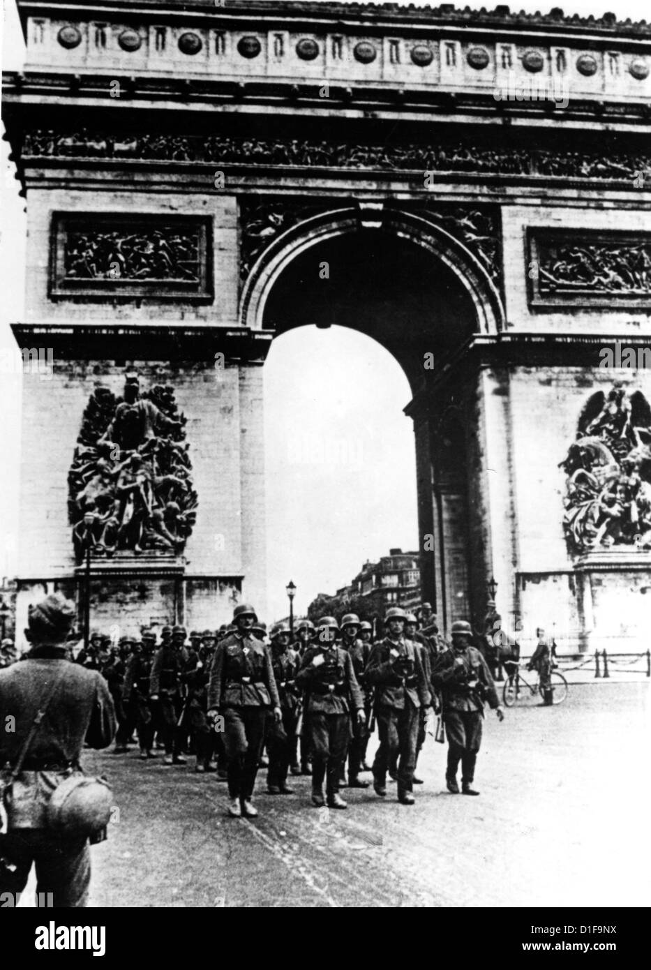 German troops march along the Champs Elysees and Arc de Triomphe in