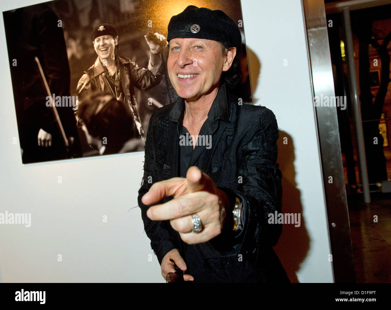 Klaus Meine, singer of rock band 'Scorpions,' stands before the opening of a photo exhibition of photographs of the band in Munich, Germany, 18 December 2012. Last night, the final concert of the 'Final Sting World Tour 2012' took place in Munich. Photo: PETER KNEFFEL Stock Photo