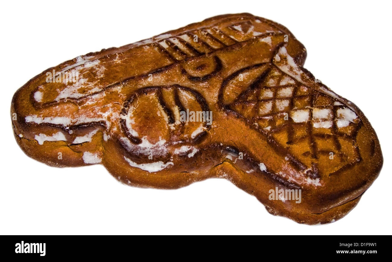 Fresh, juicy honeycake in the form of a gun Stock Photo Alamy