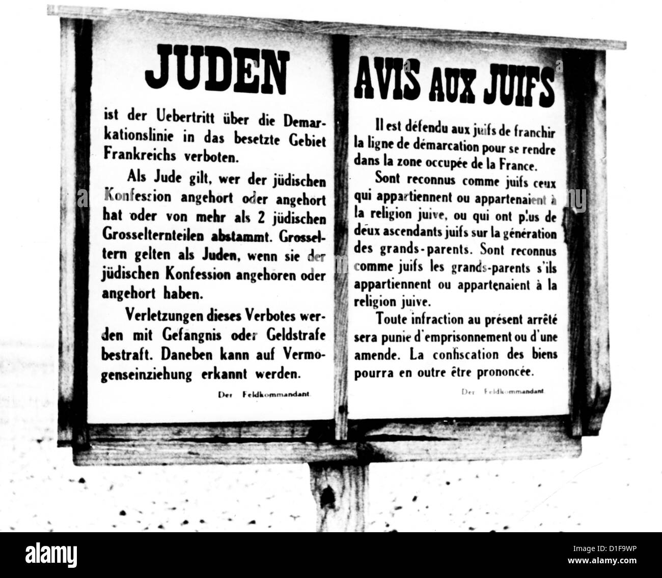 A sign in German and French language declares that Jews are not allowed to corss the demarcation line to enter the zone of occupied France, in March 1941. Fotoarchiv für Zeitgeschichte Stock Photo