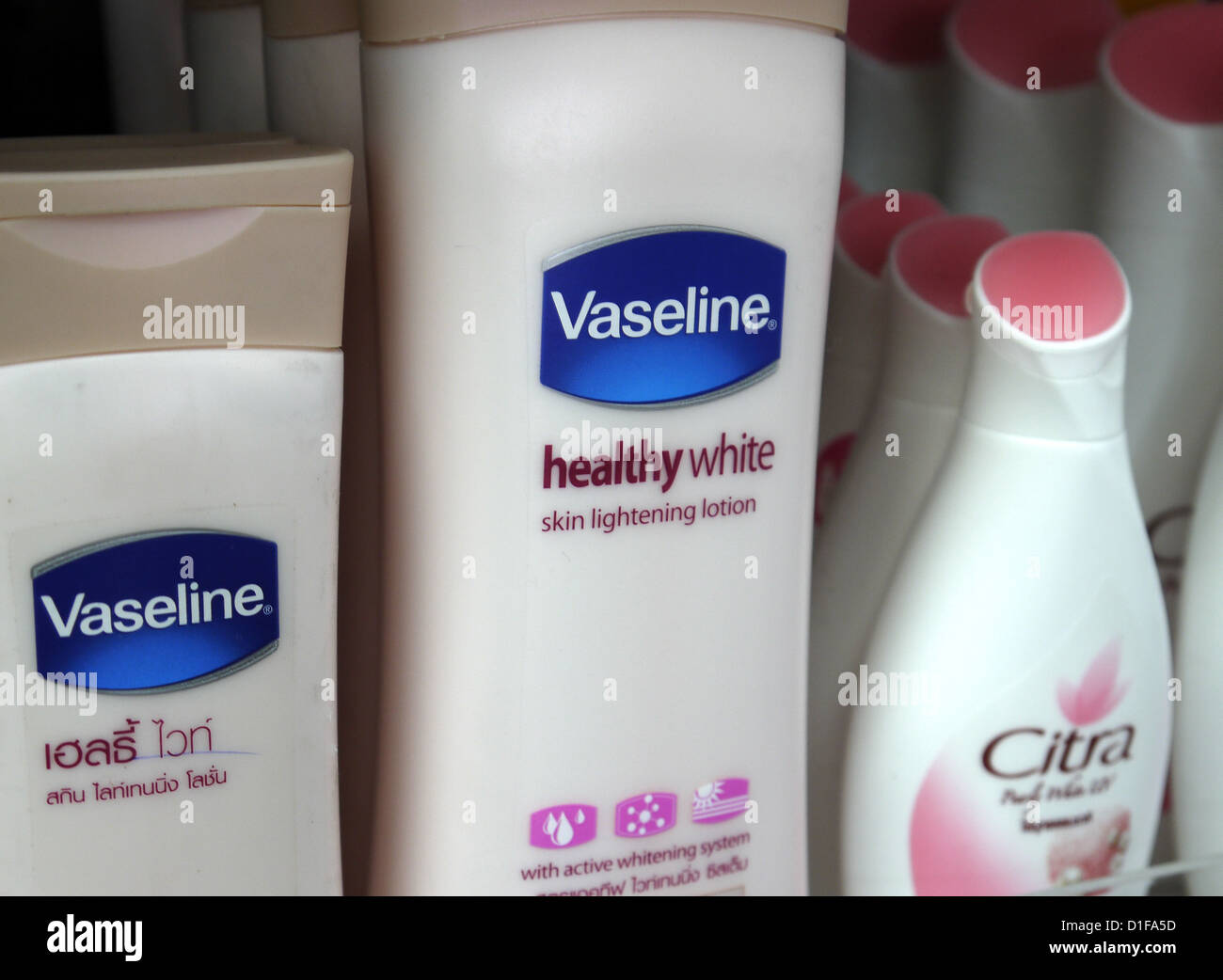 So-called Whitening Creme and Body Lotion are on display in a supermarket  in Bangkok, Thailand, 22 October 2011. Photo: Soeren Stache Stock Photo -  Alamy
