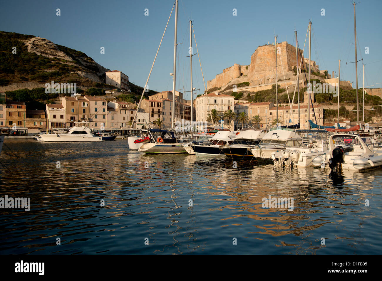A view of yachts in the harbour and the citadel in Bonifacio, Corsica, France, Mediterranean, Europe Stock Photo