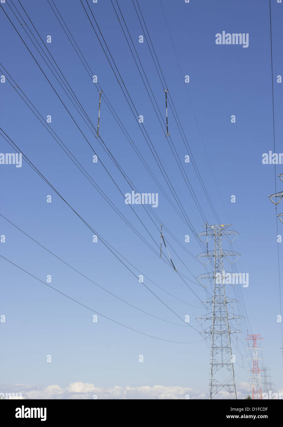 Blue sky and transmission towers Stock Photo - Alamy