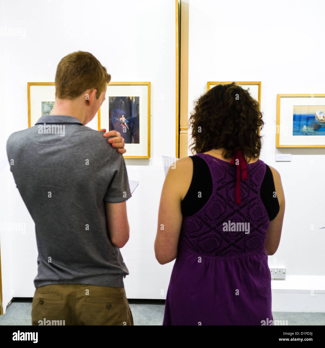 Aberystwyth university school of art, rear view of two students looking