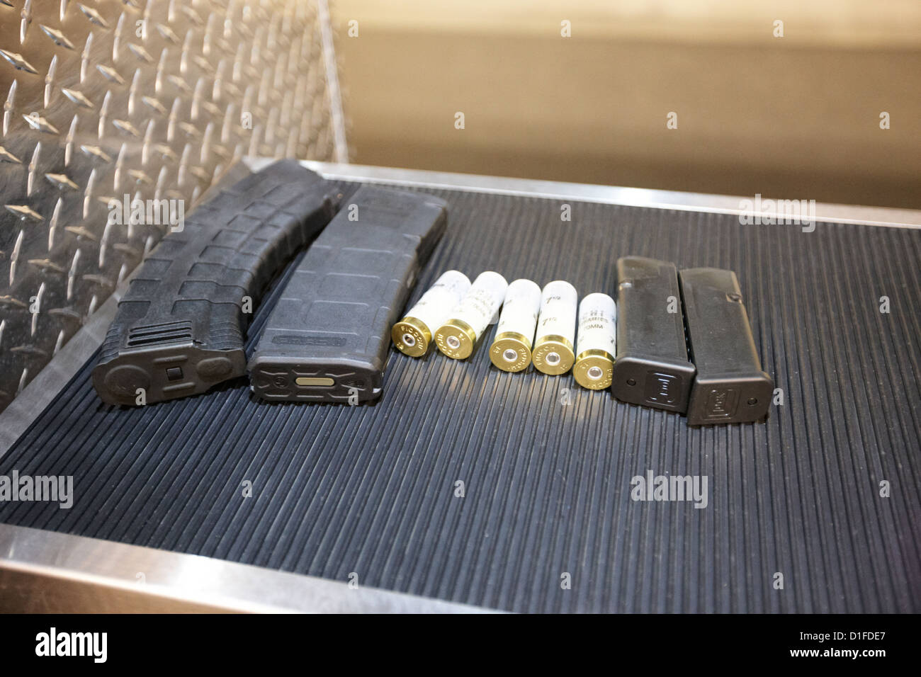 various rifle assault weapon pistol magazines and shotgun shells at a gun range in las vegas nevada usa Stock Photo
