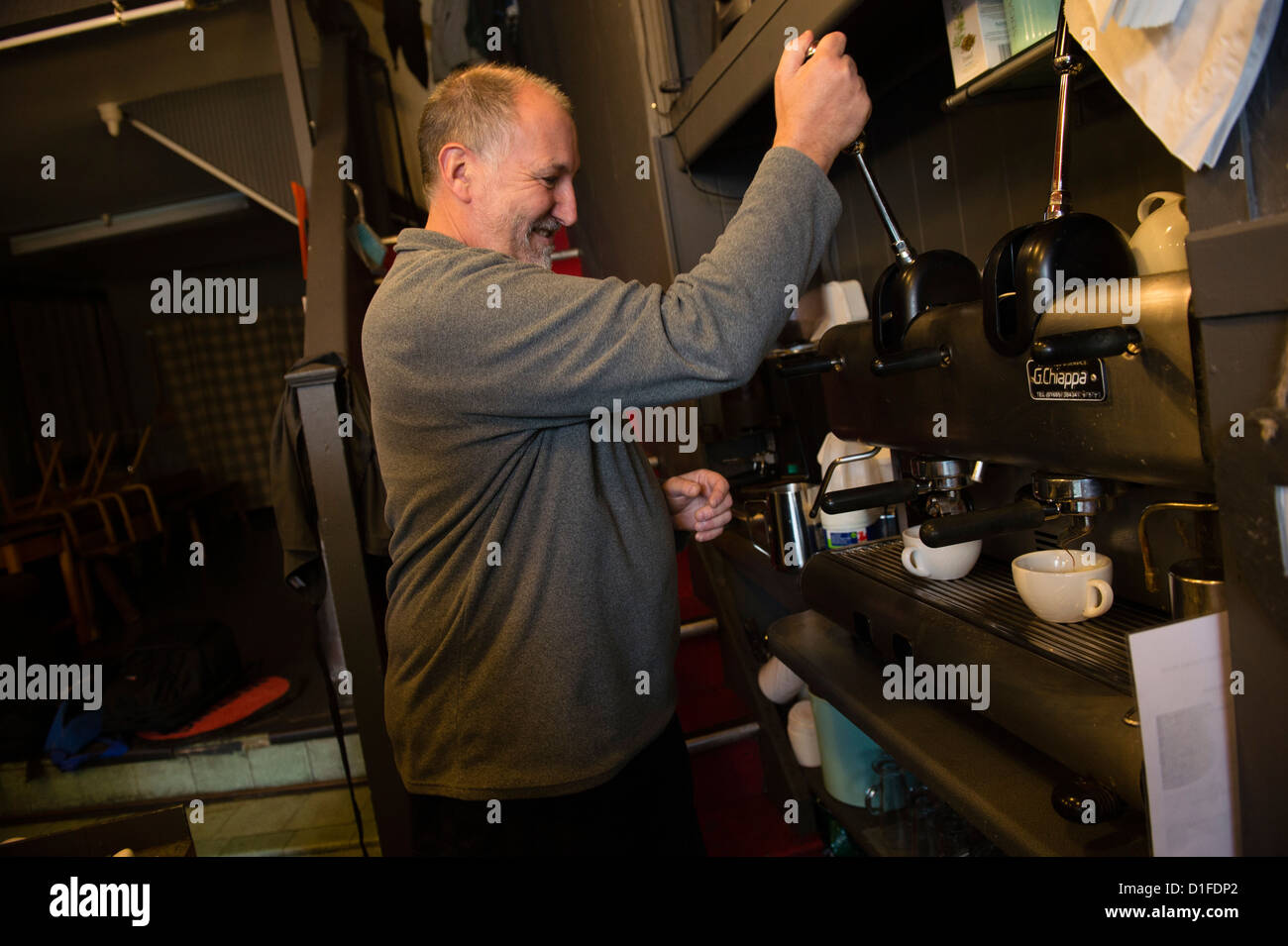 ANGELO CONTI making an espresso coffee in Conti's Cafe, Lampeter, Ceredigion Wales UK Stock Photo