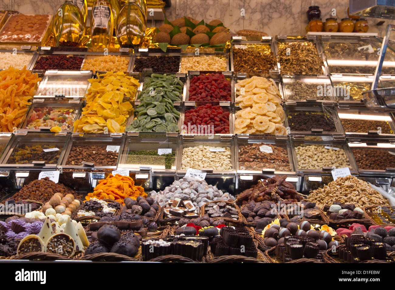 Sweets chocolates displayed in market La Boqueria Barcelona Spain Stock