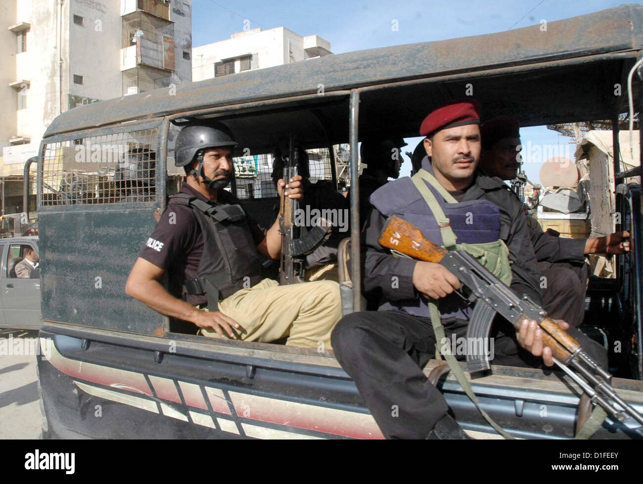 Police commandos take part in an operation against criminals believed ...