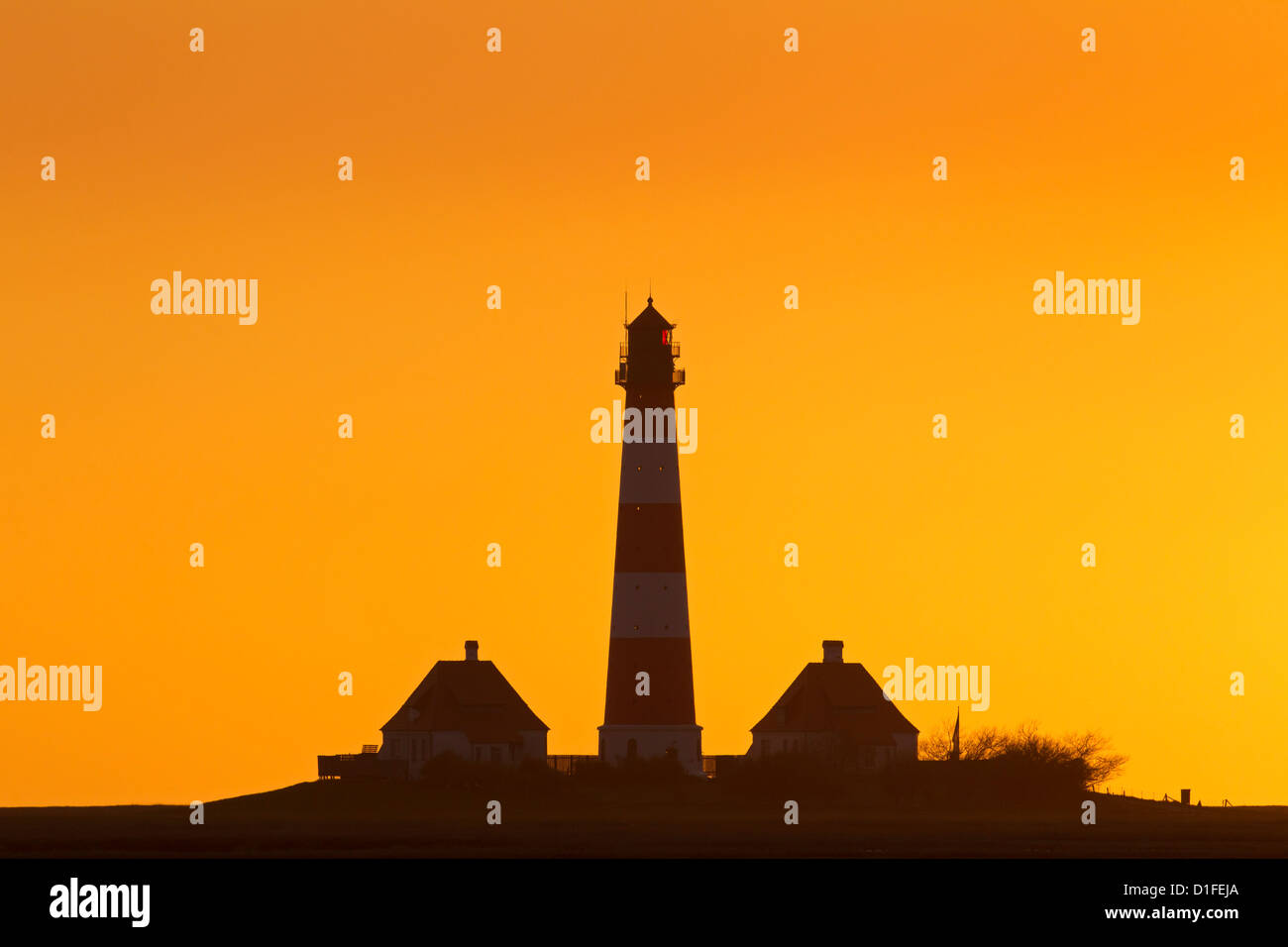 Lighthouse Westerheversand at sunset, Westerhever, North Frisia, Schleswig-Holstein, Germany Stock Photo