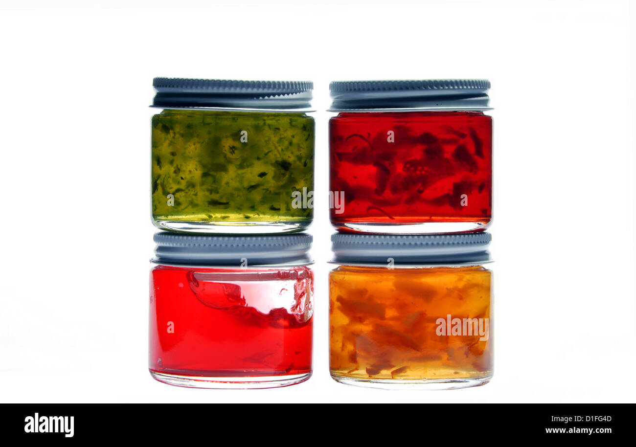 Four different types of jam jar isolated on white background Stock