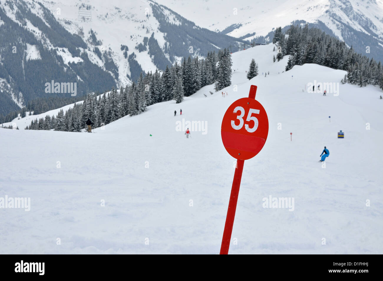 A red ski slope with number 35 in the Austrian Alps Stock Photo