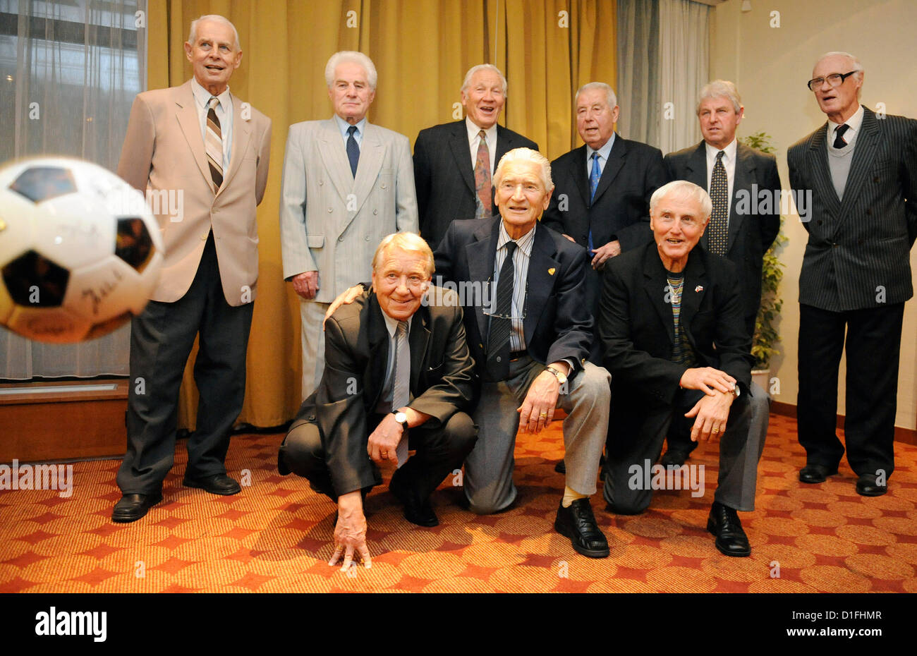 Czechoslovak silver medallists form the soccer World Cup 1962 pose during press conference ahead of the Award ceremony Sportsman of the Year on December 19, 2012 in Prague, Czech Republic. Upper row from left: David Svoboda, Jan Lala, Adolf Scherer, Josef Masopust,Vaclav Masek, Titus Bubernik, sitting from left: Josef Jelinek, Josef Kadraba, Josef Stibranyi. Former soccer players were announced Legends of Sport. (CTK Photo/Stanislav Zbynek) Stock Photo