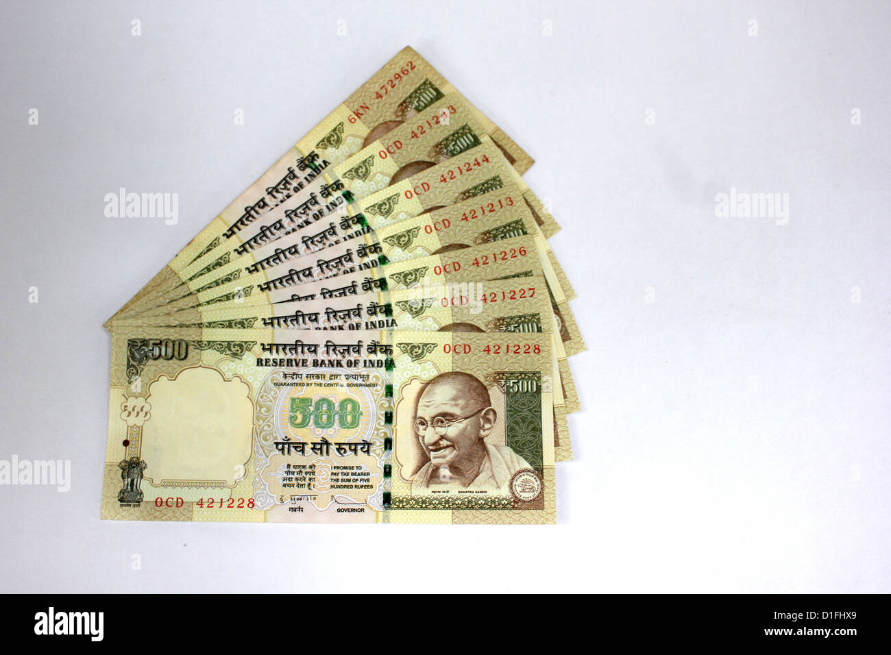 Indian currency A fan of five hundred rupee notes in white background 500 Stock Photo