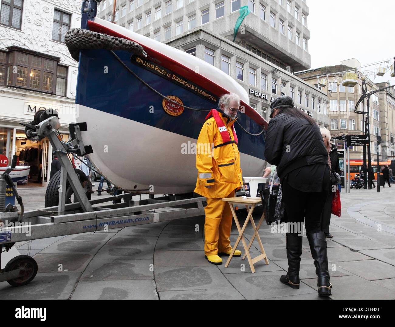 Man collecting for RNLI lifeboat charity Newcastle  city centre north east England UK Stock Photo
