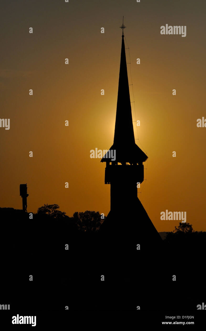 Beautiful silhouette of a church tower in the sunset Stock Photo - Alamy