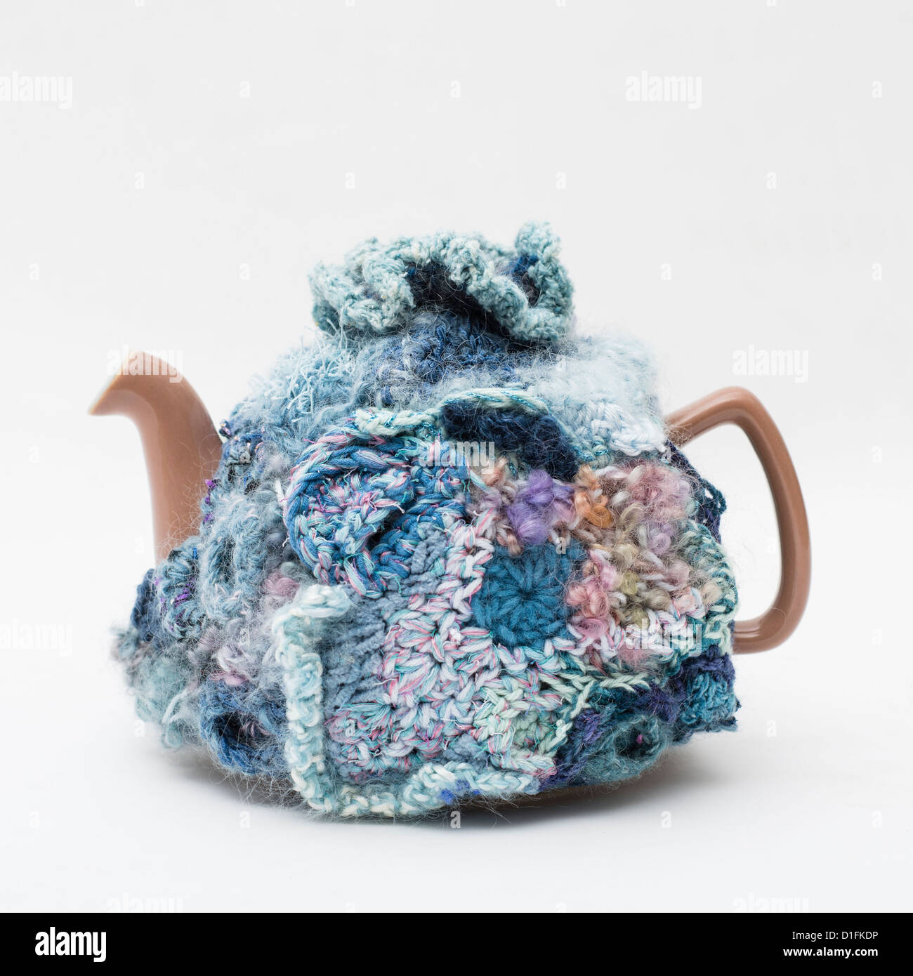 A Crocheted Tea cosy by KASTURI TUSLER Stock Photo