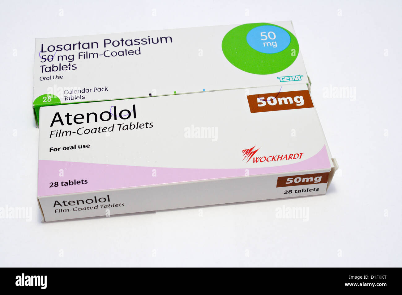 Photograph of Atenolol a beta blocker and Losartan Potassium tablets a drug to treat high blood pressure both are prescribed in the UK, Stock Photo