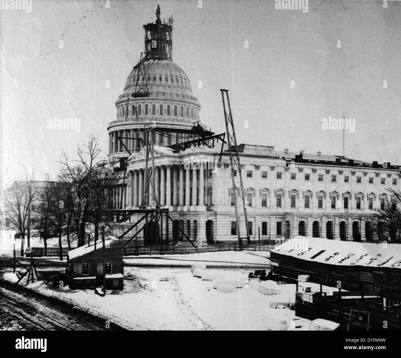 United States Capitol December 1863 - recently installed Statue of Freedom along with the Senate Chamber under construction. Stock Photo