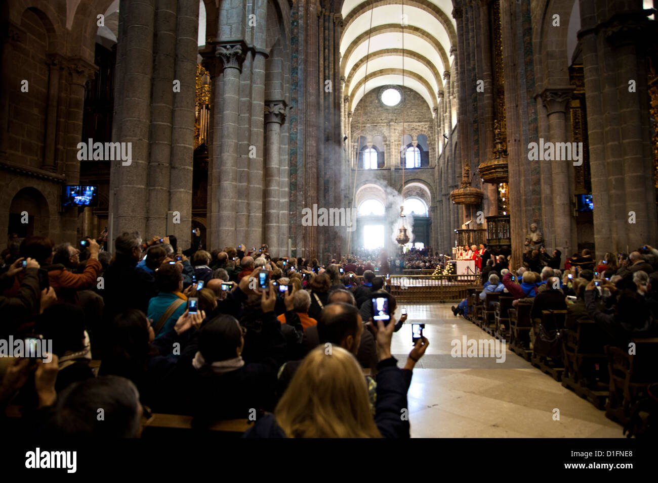 Incense smoke from the Botafumeir during the pilgrim Mass at the