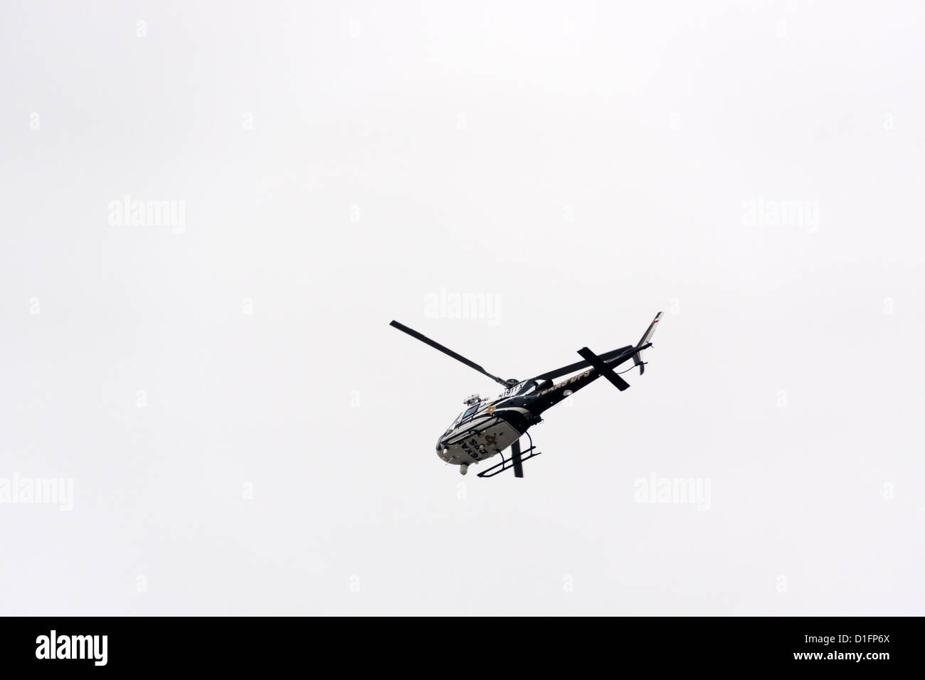Texas Department of Public Safety helicopter hovering above Mission, Texas Stock Photo