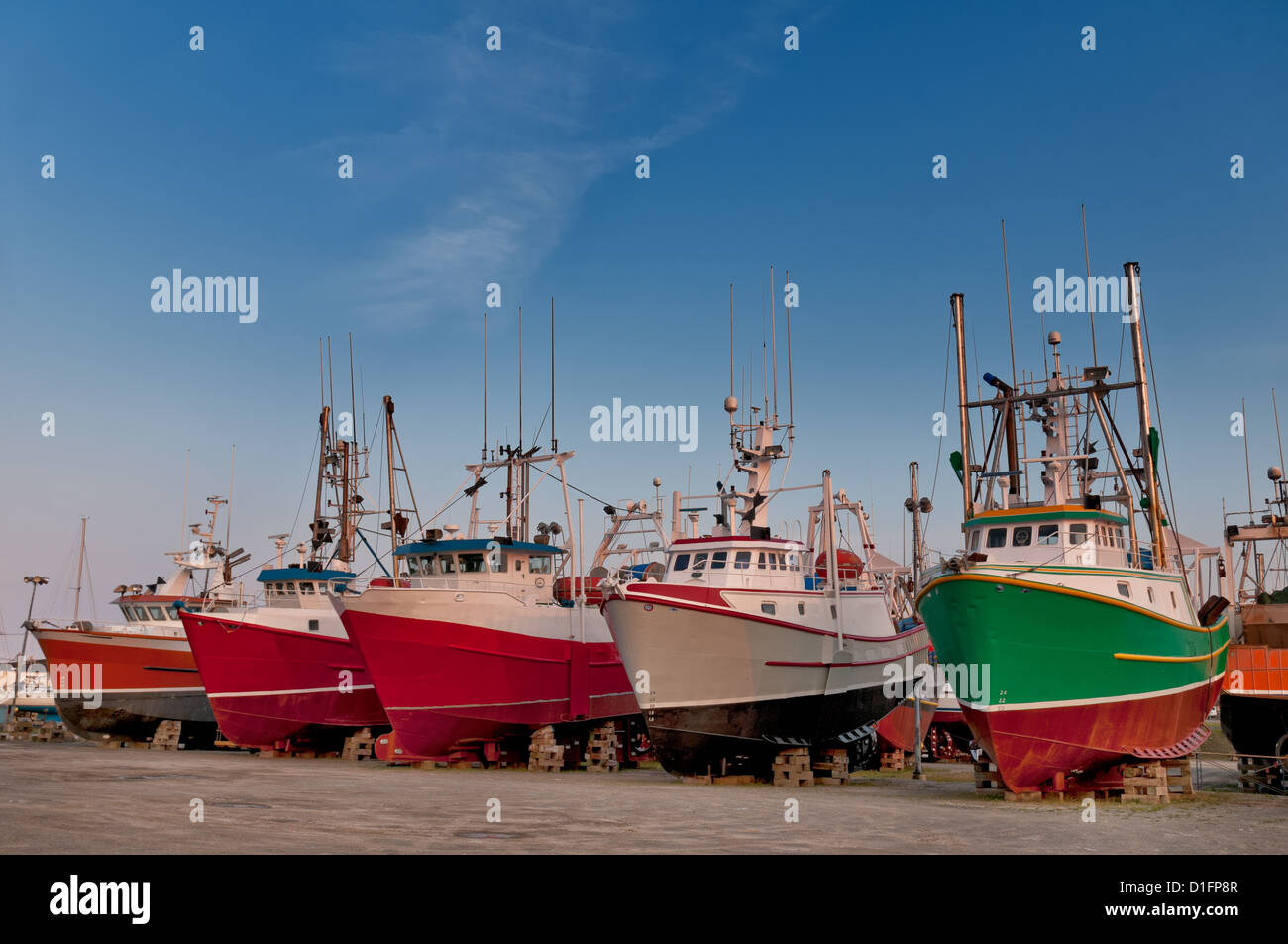 Fish trawler on land during off peak season, ship goes through maintenance Stock Photo