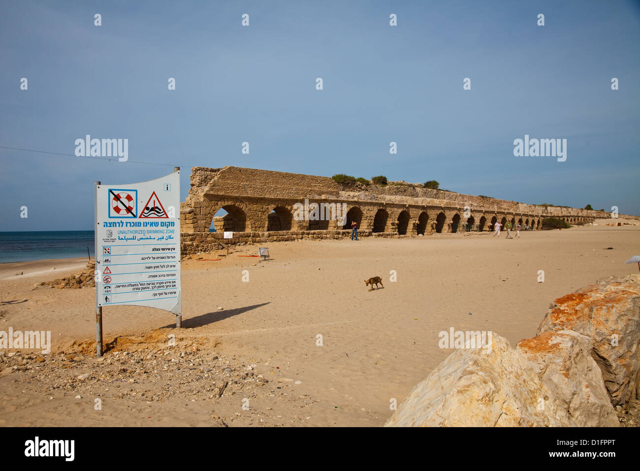 Overall view of the Roman aqueduct in Caesarea, Israel Stock Photo