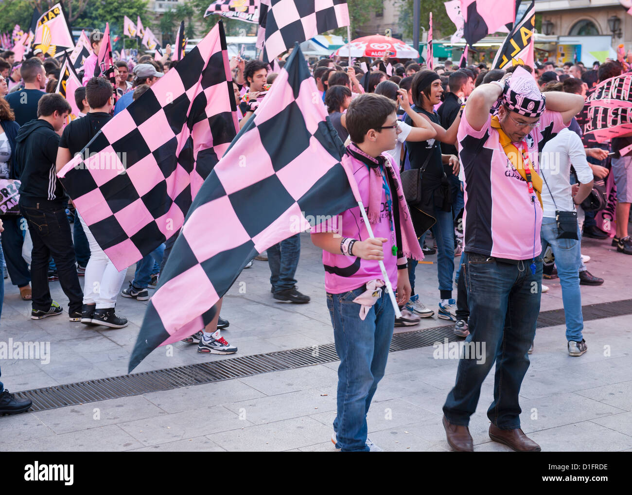 Fans of Palermo Football Club show their colors on game day