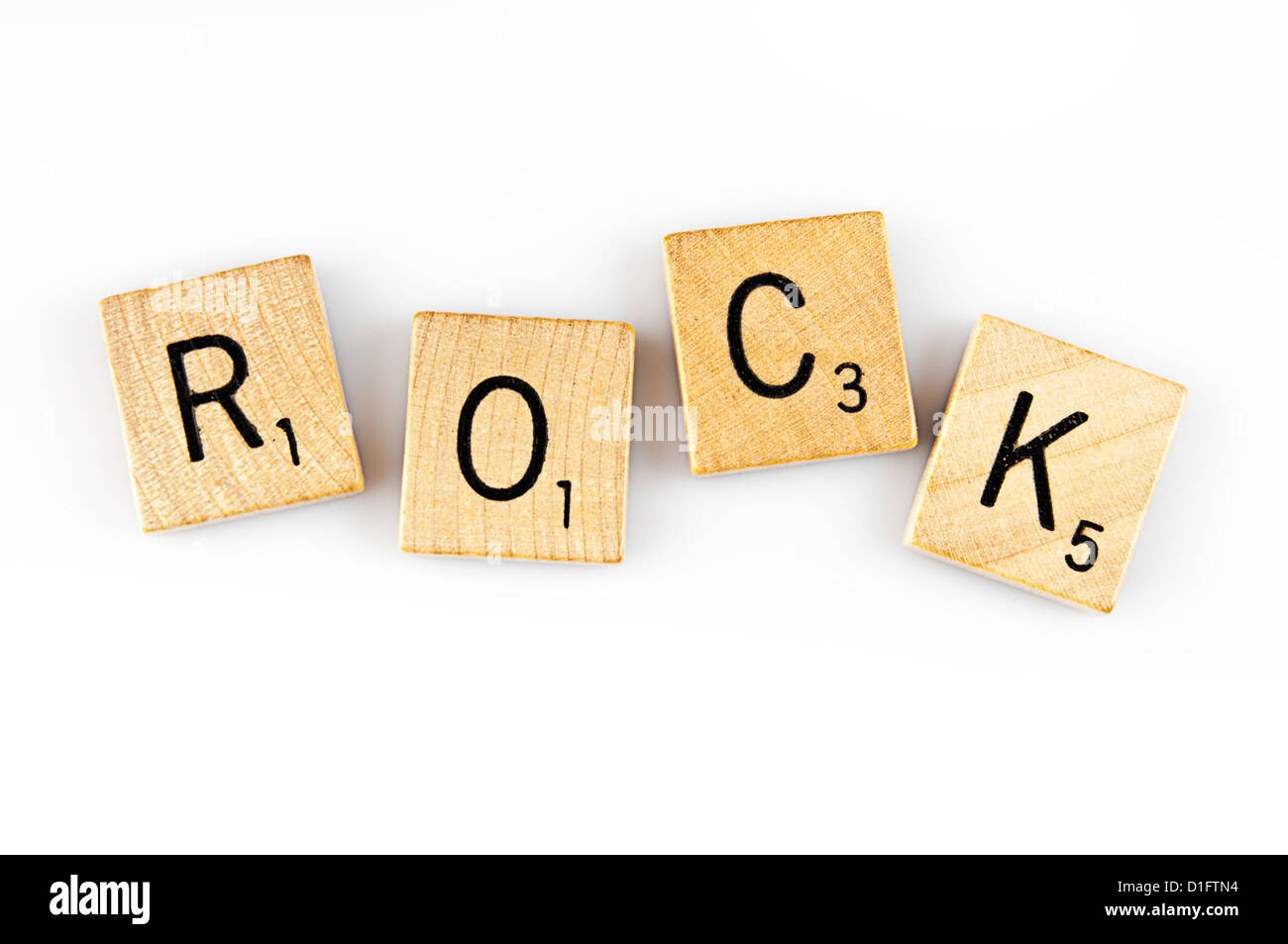 word rock spelled with scrabble tiles letters Stock Photo Alamy