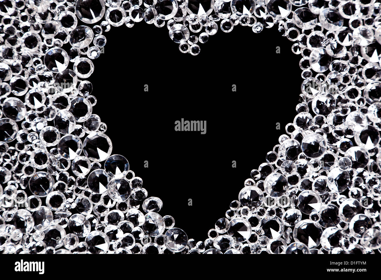 Imitation fake diamonds isolated on a black background Stock Photo - Alamy