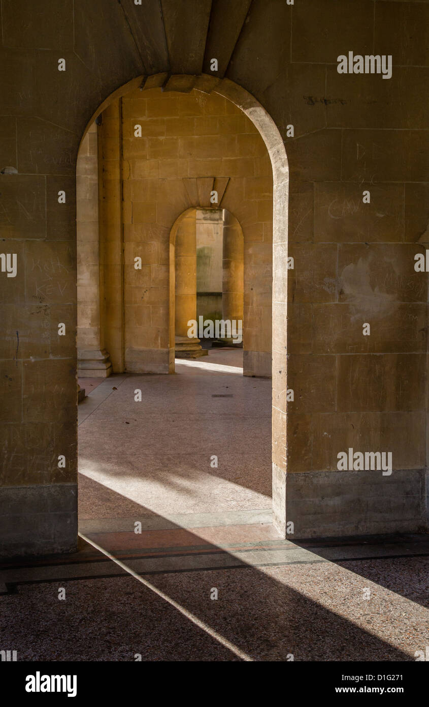 Receding arches beneath Grand Parade in Parade Gardens Bath Spa UK Stock Photo