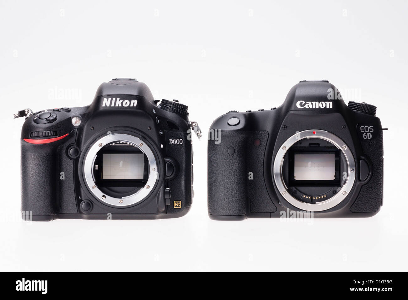 Photographic equipment - the Nikon D600 and Canon 6D (2012) bodies side by side, competing low priced full format camaeras. Stock Photo
