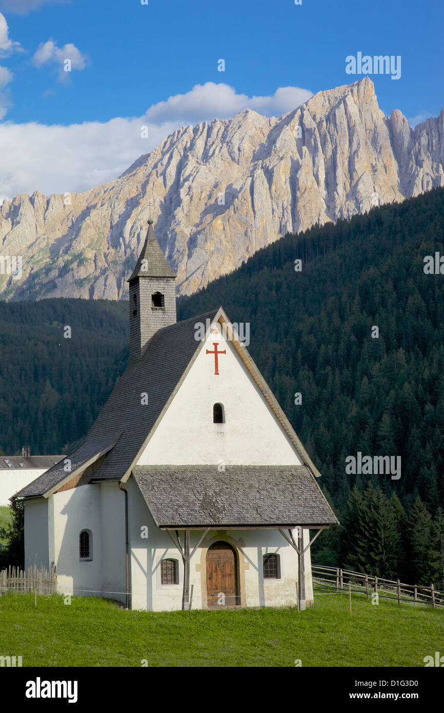 Church and Latemar Group mountains near Welschnofen, Bolzano Province, Trentino-Alto Adige/South Tyrol, Italian Dolomites, Italy Stock Photo