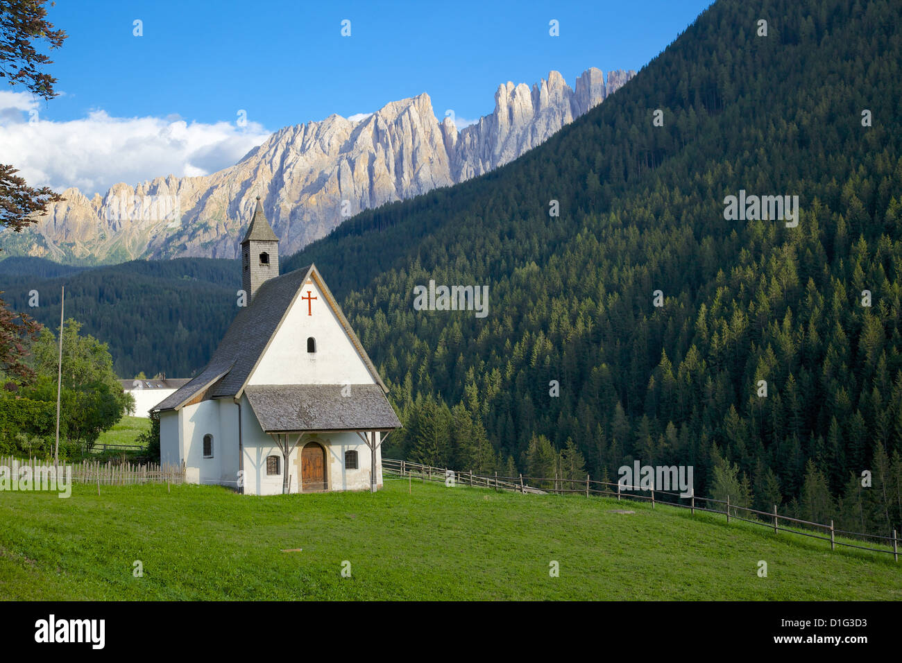 Church and Latemar Group mountains near Welschnofen, Bolzano Province, Trentino-Alto Adige/South Tyrol, Italian Dolomites, Italy Stock Photo