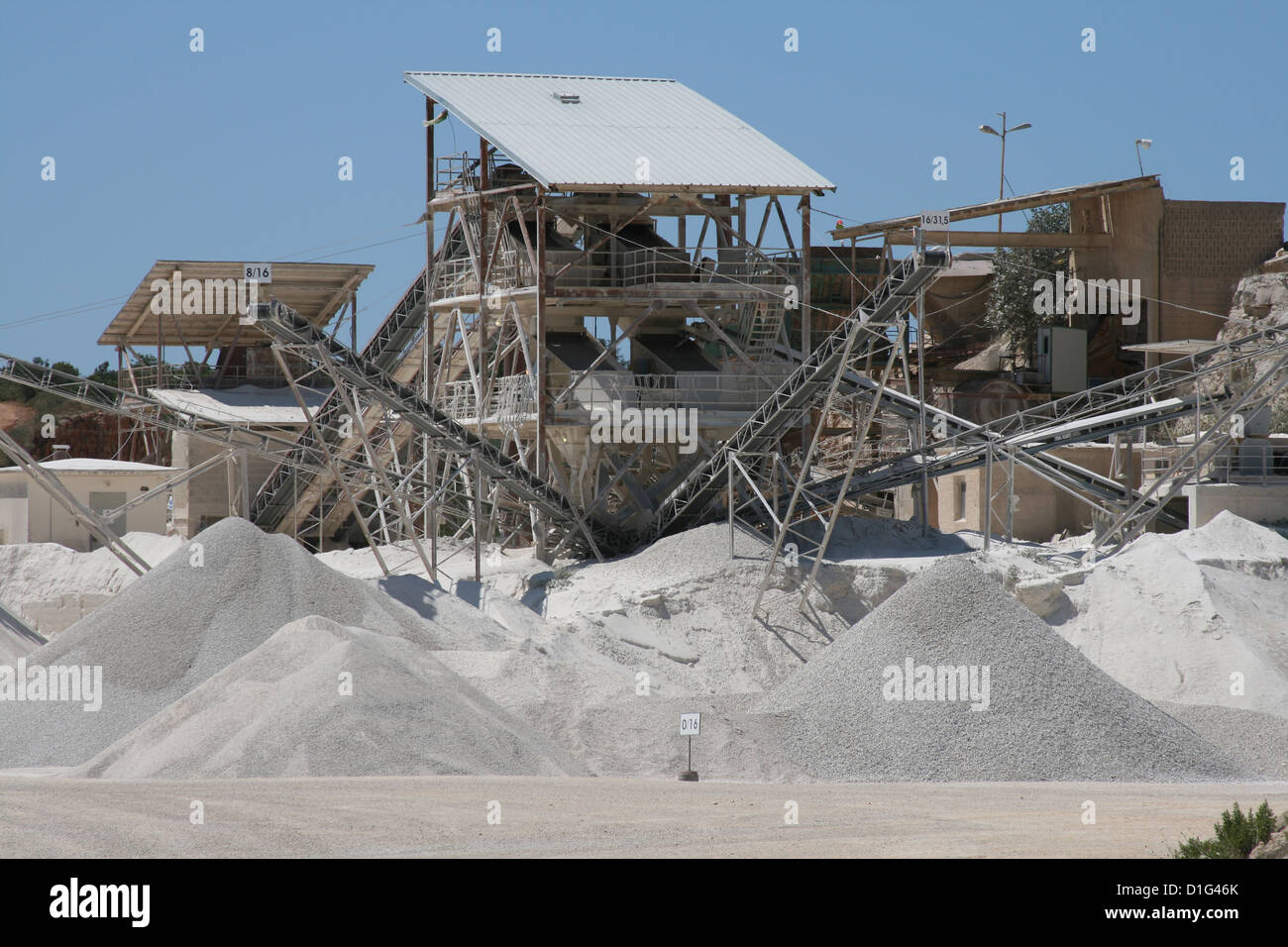 Making of crushed stone at stone quarry Stock Photo Alamy