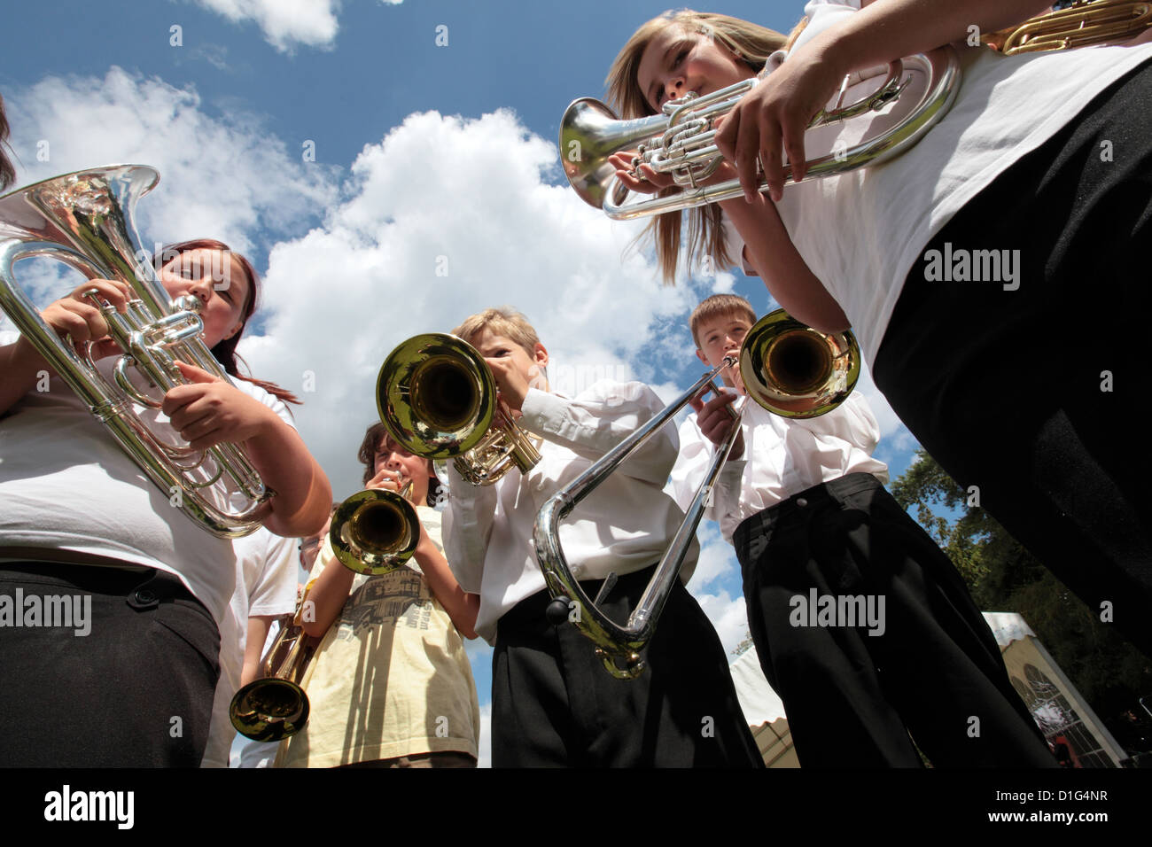 Leiston British Legion Youth Brass Band members outside before performance, Leiston, Suffolk, UK Stock Photo