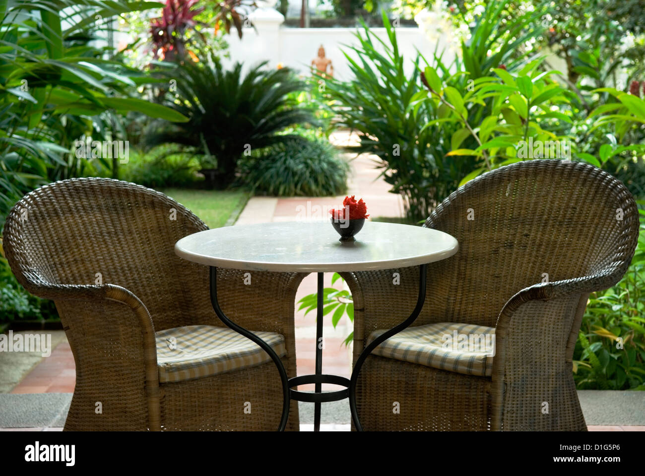 Terrace table and chairs in hotel, Kochi (Cochin), Kerala, India, Asia