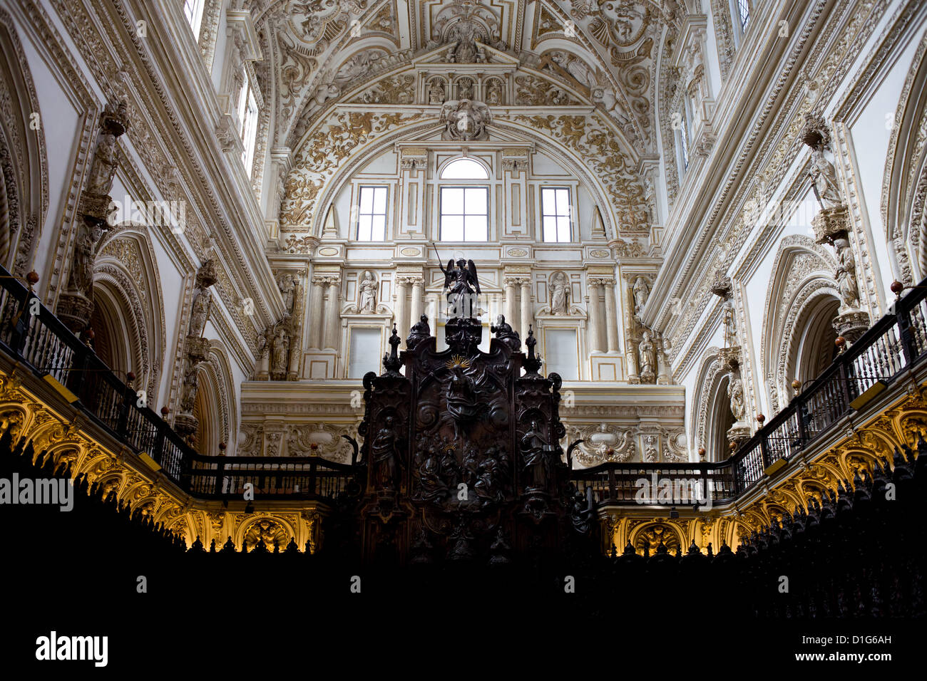 Interior of the Cathedral Mosque (La Mezquita) in Cordoba, Spain, illuminated mahogany choir stalls. Stock Photo
