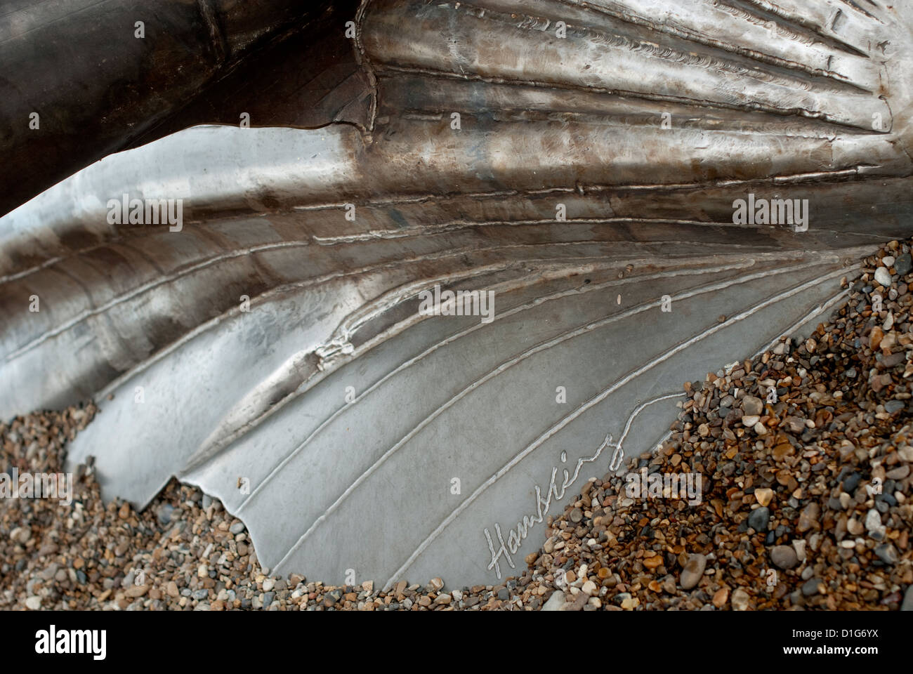 a close up image of the detail of the signature of Hambling on The Scallop sculpture at Aldeburgh. Stock Photo