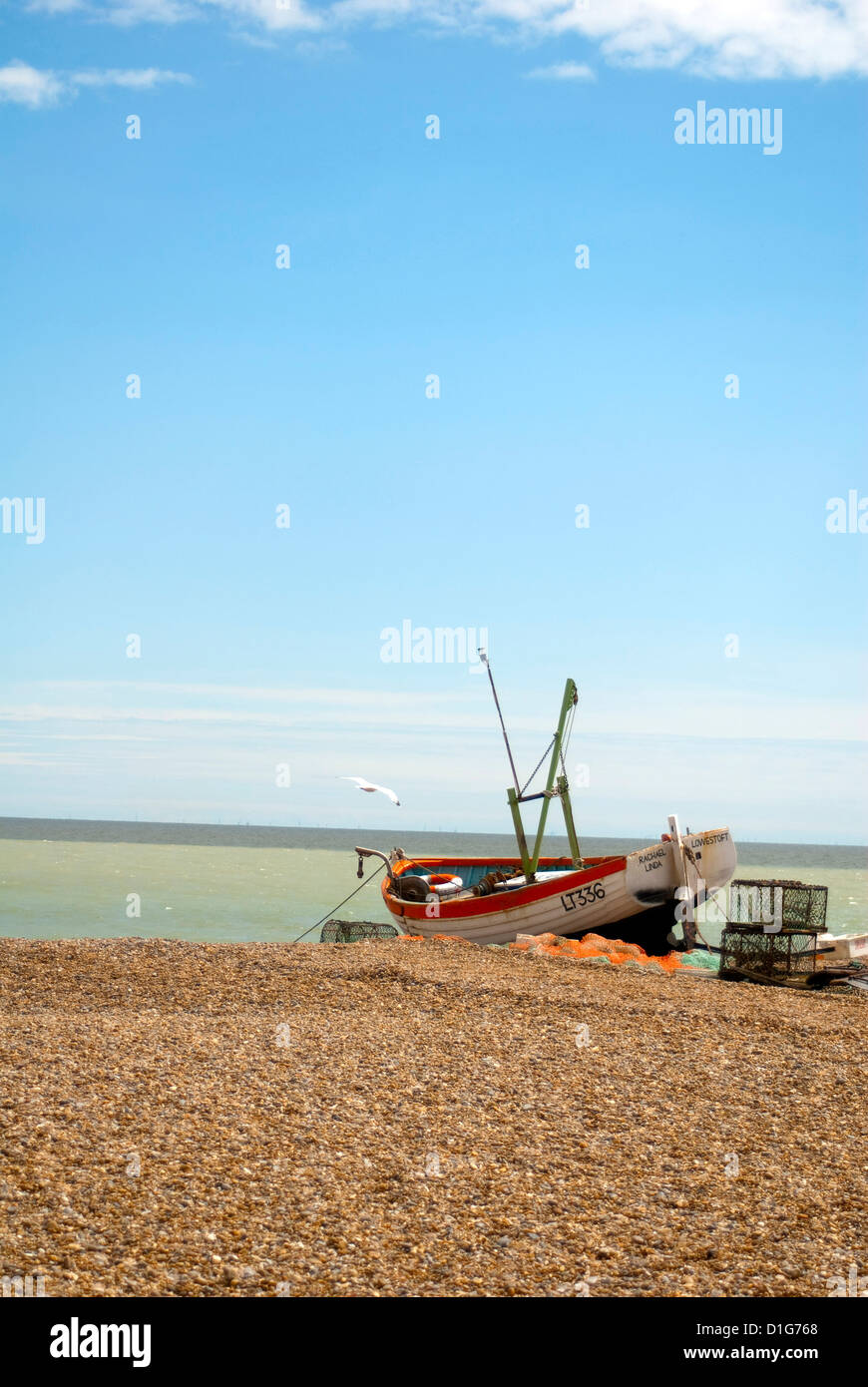 A fishing boat on the shingle beach at Aldeburgh, Suffolk, East Anglia Stock Photo