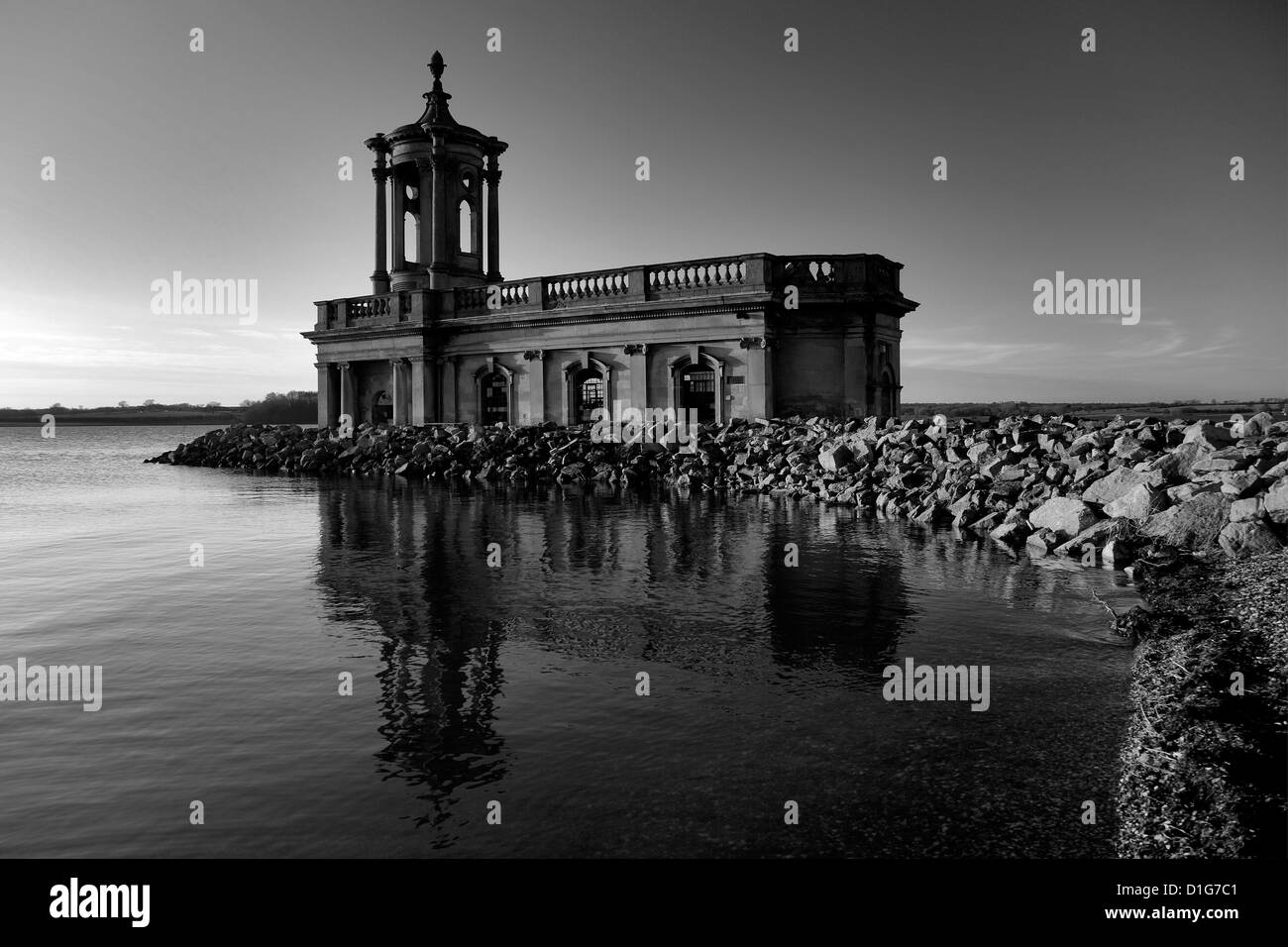 Black and White panoramic image, Normanton church reflected in Rutland Water Reservoir, Rutland County, England, UK Stock Photo