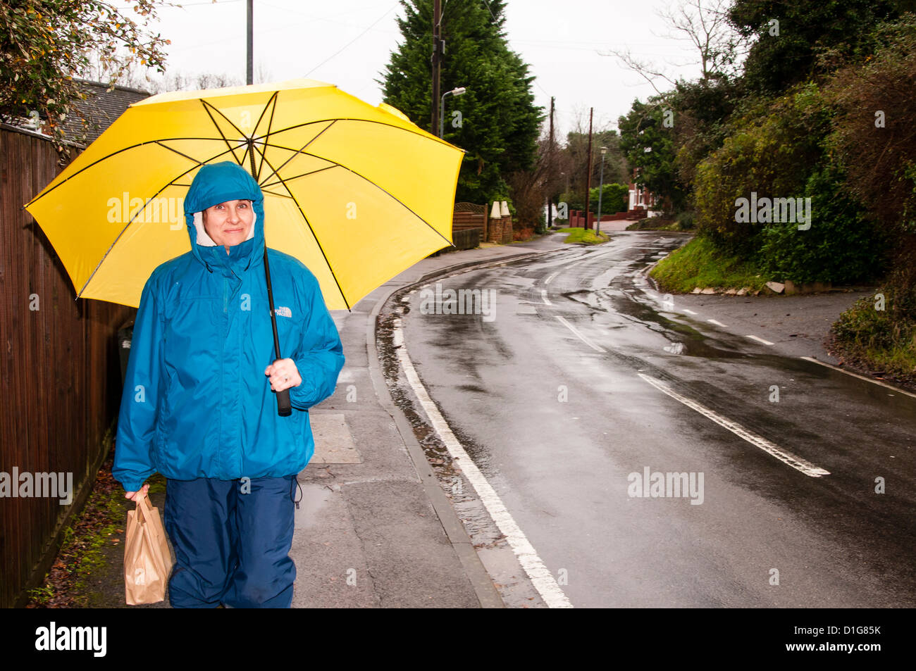 Yellow unbrella hires stock photography and images Alamy